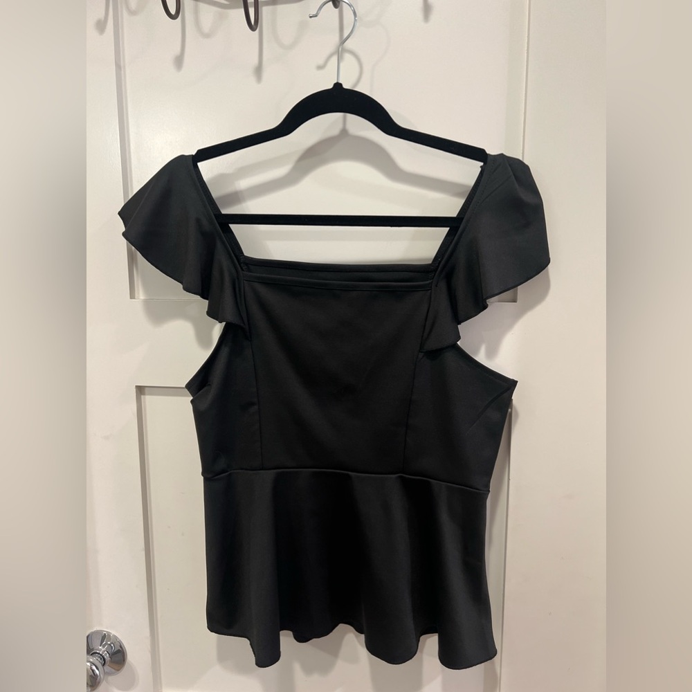 Sleeveless peplum top